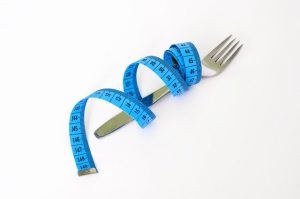 a picture of a fork to illustrate losing weight