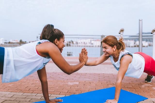two women doing fitness together