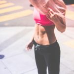 woman doing fitness in the street