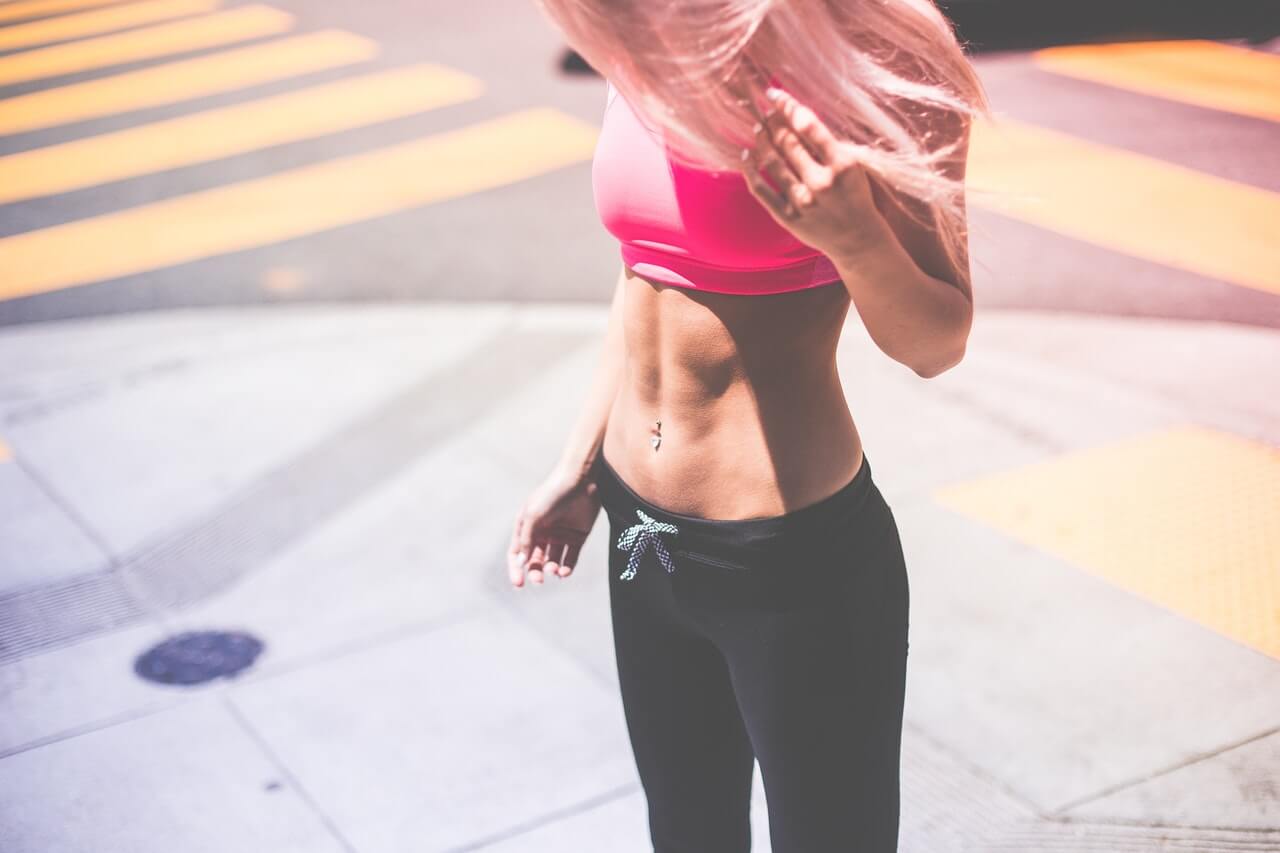 woman doing fitness in the street